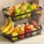 Sevenblue 2-Tier Fruit Basket with Banana Hangers, Detachable Metal Bowl | Wooden handle, protective mats included. Versatile holder for bread, snacks, and veggies. Large 2 tier metal design.